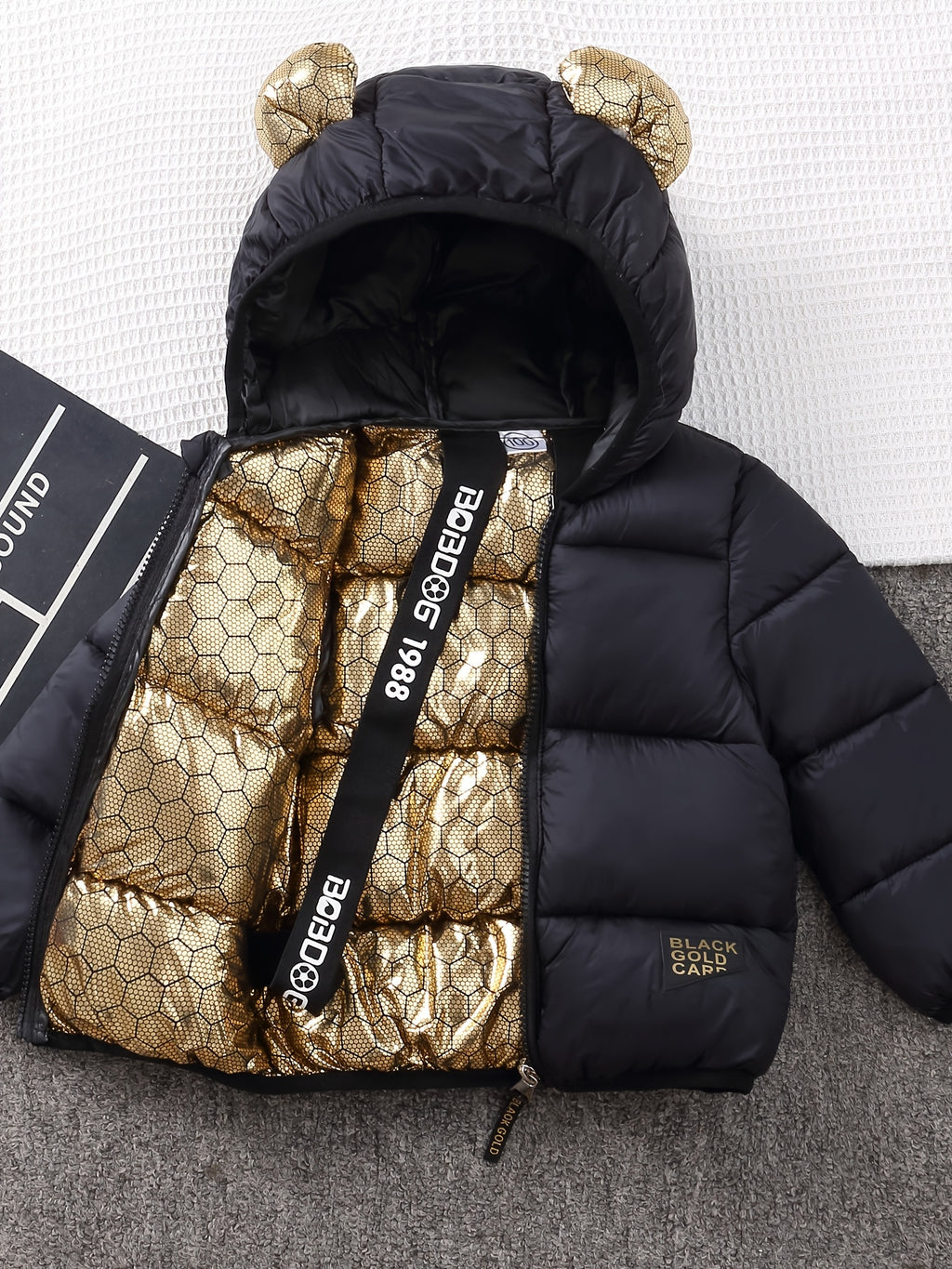 Veste matelassée matelassée nid d'abeille noire et dorée à capuche et — Monptitlou