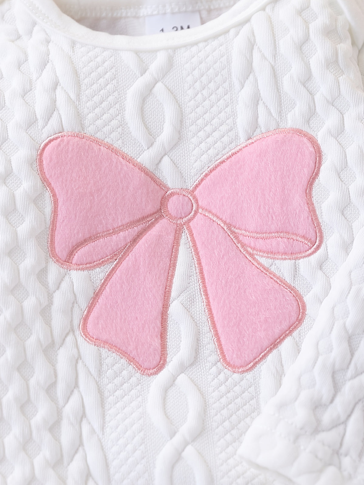 Grenouillère bébé tricotée jacquard, à pieds — Monptitlou Image