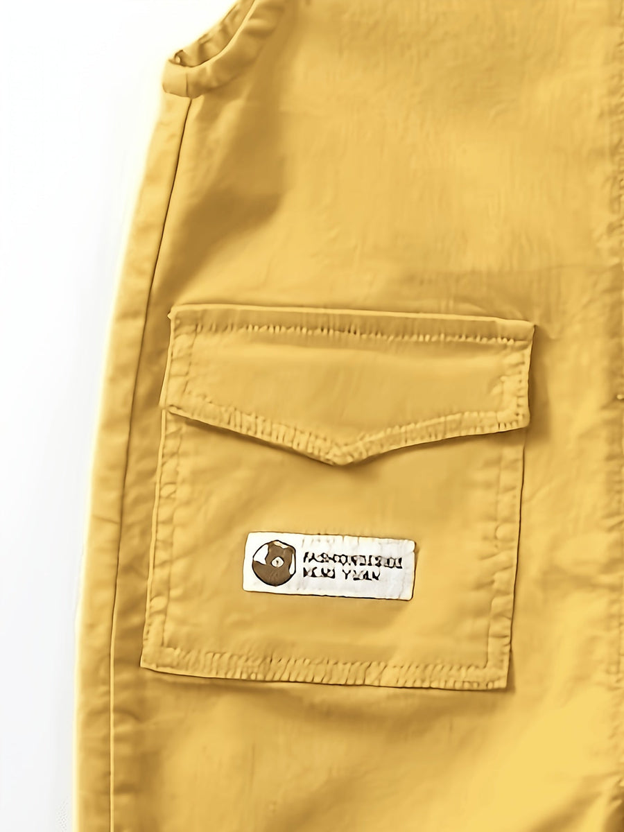 Salopette bébé légère et extensible à motif cartoon ours brodé, idéale pour l'extérieur