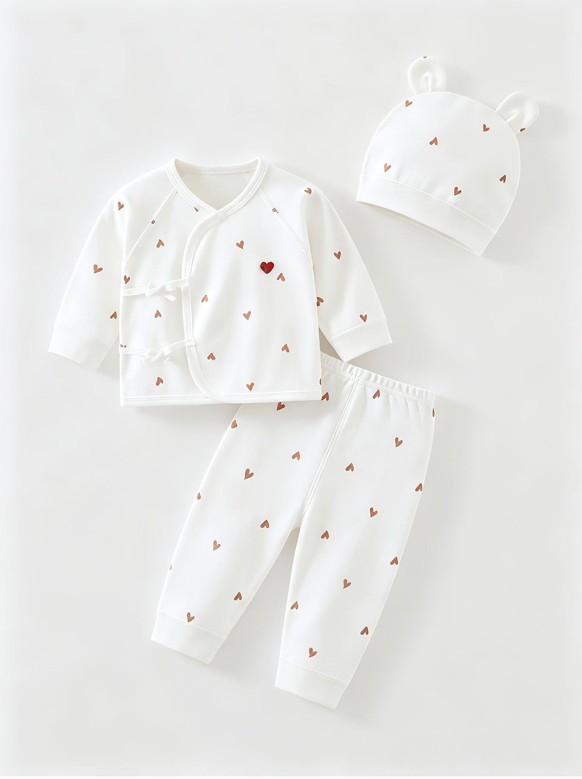 Tenue nouveau-né ensemble haut et bas imprimé cœur doux avec bonnet — Monptitlou Image