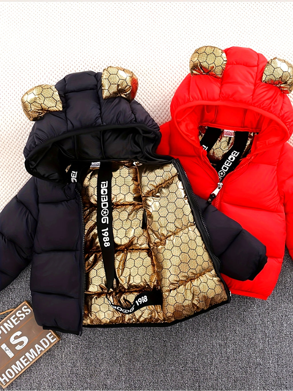 Veste matelassée matelassée nid d'abeille noire et dorée à capuche et
