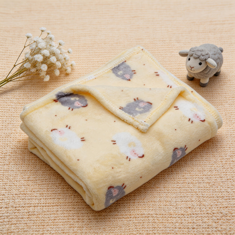 Une couverture à motif de mouton adaptée à toutes les saisons — Monptitlou
