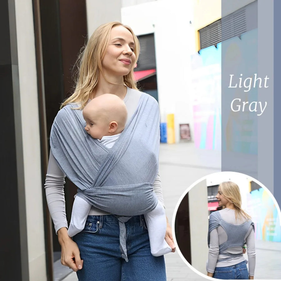Porte-bébé confortable, sécurité avant tenant un nouveau-né — Monptitlou