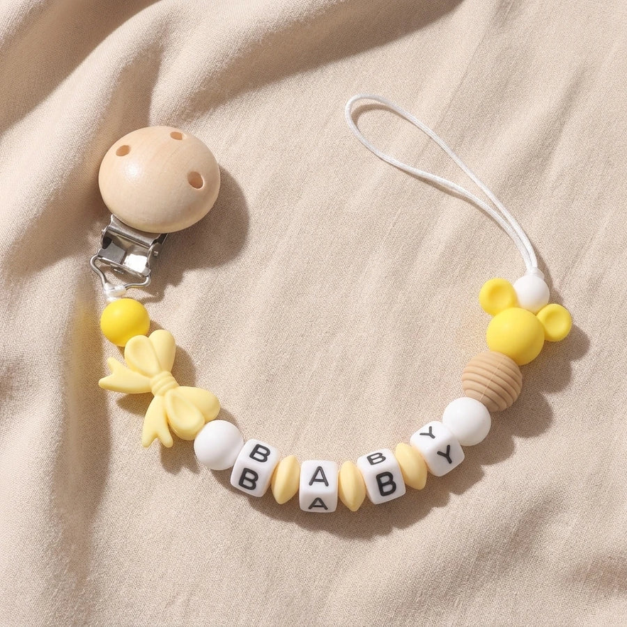 Support de sucette en silicone pour bébé, personnalisable avec nom — Monptitlou
