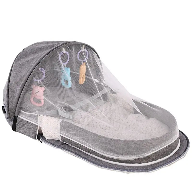 Lit nomade pliable pour bébé avec moustiquaire — Monptitlou