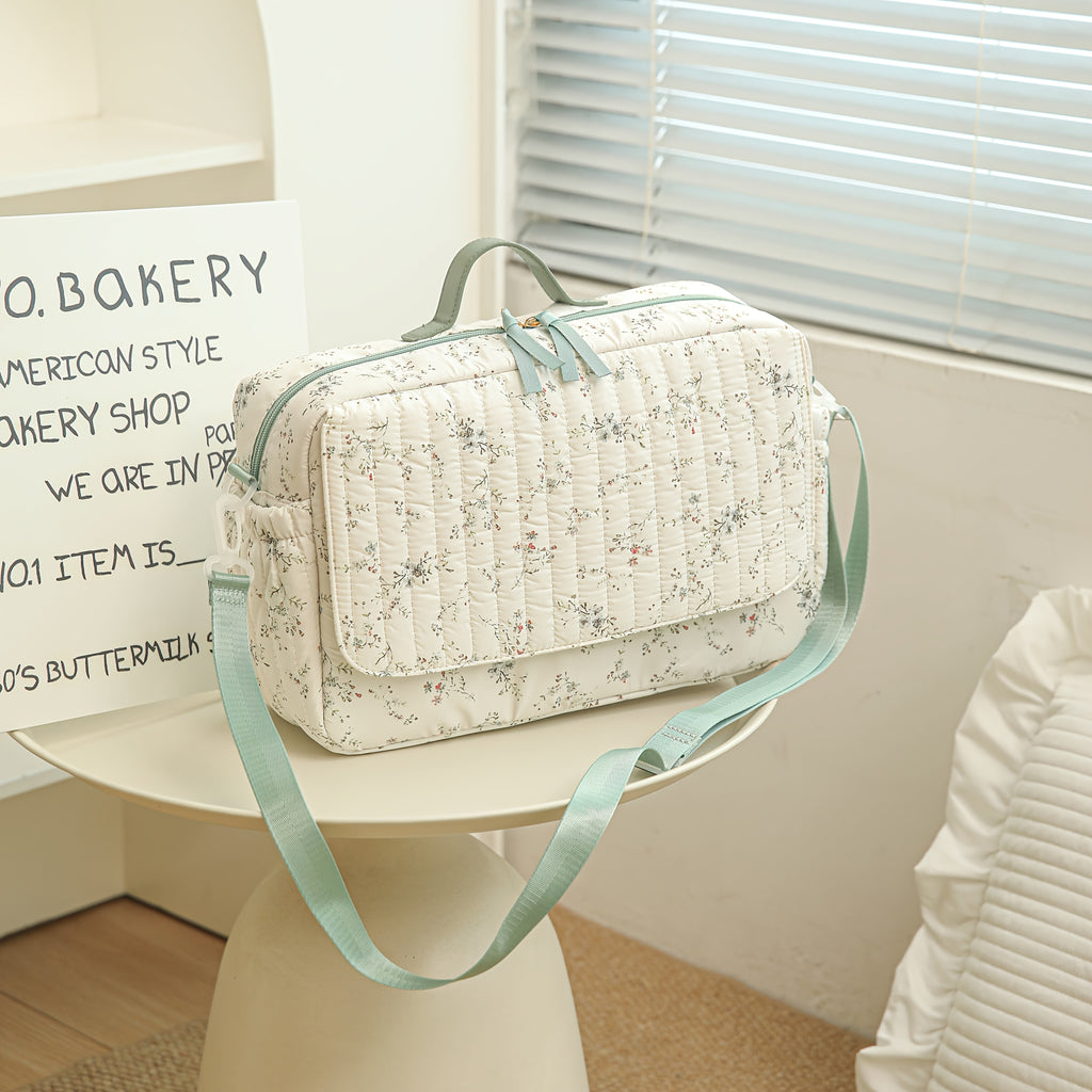 Sac à langer à imprimé floral vert avec un motif floral vert doux et à — Monptitlou